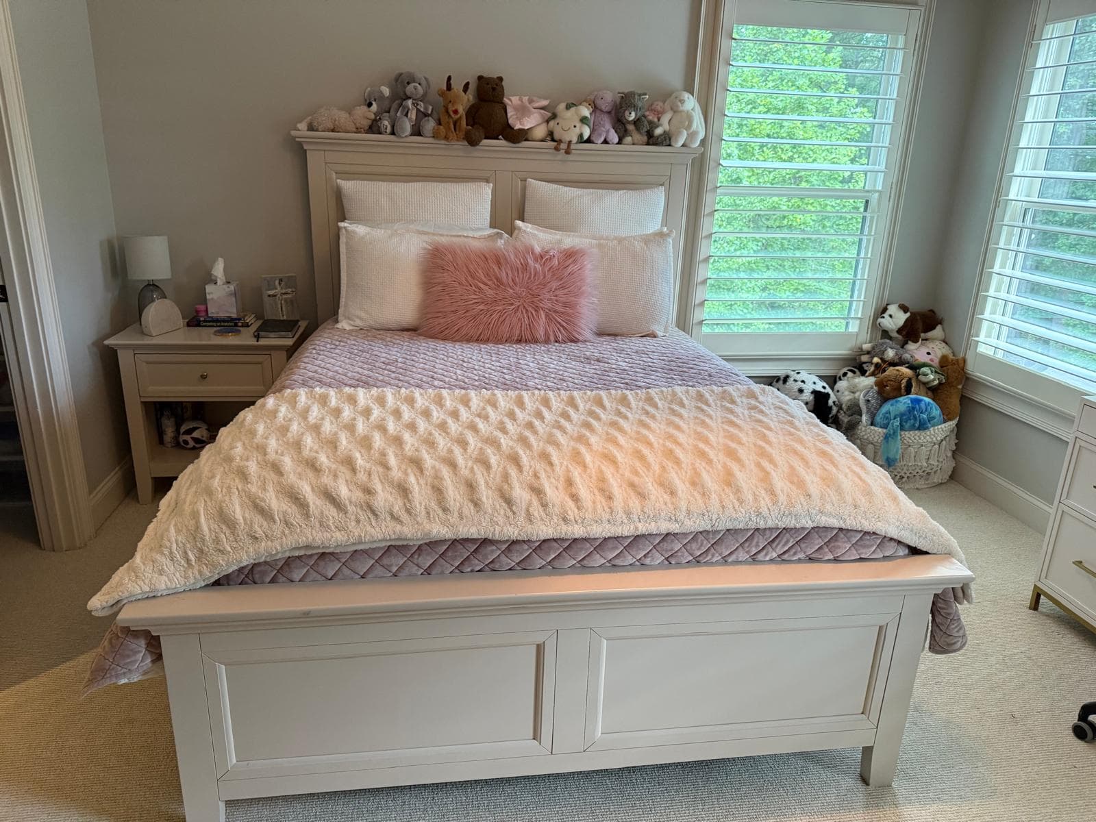 Freshly made bed after a residential cleaning visit in Alpharetta