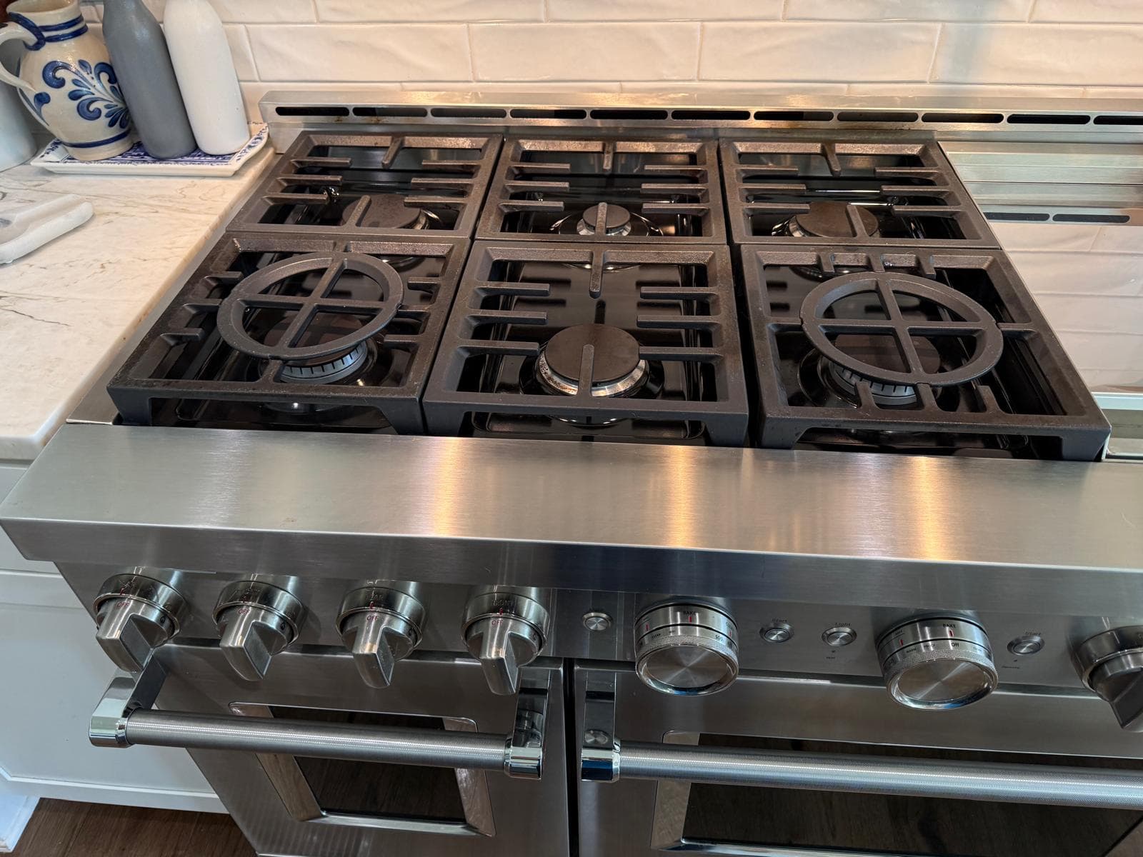 Stainless steel gas range after a kitchen deep clean